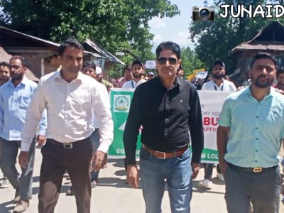 Prof Mohammad Shafi Lone (Principal) leading the Cyber Jaagrookta Rally in. Sogam Town 2022